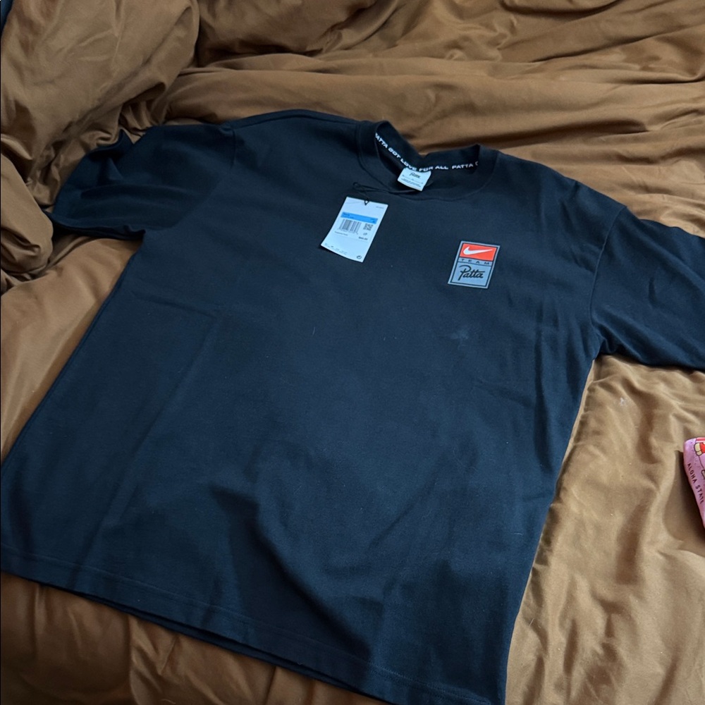 Nike Men's Black Short Sleeve Tee with Red Logo